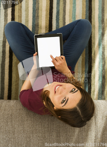 Image of Woman using a digital tablet