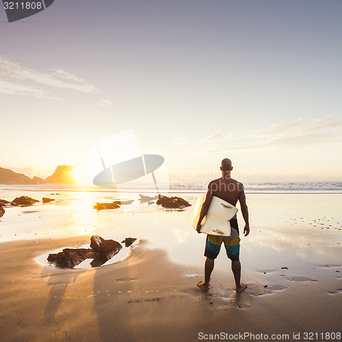 Image of Man surfing 