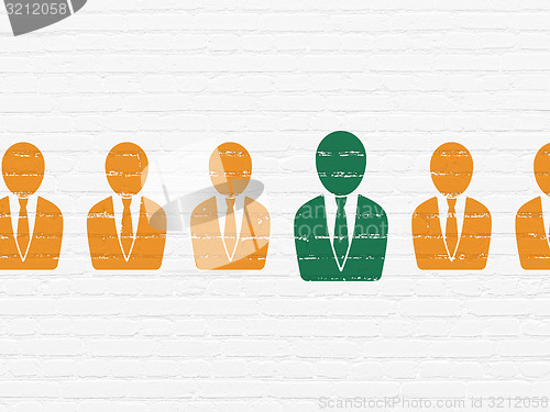 Image of Business concept: business man icon on wall background