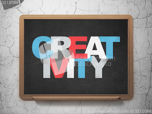 Image of Marketing concept: Creativity on School Board background