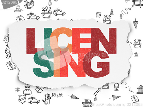 Image of Law concept: Licensing on Torn Paper background