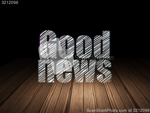 Image of News concept: Good News in grunge dark room