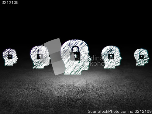 Image of Protection concept: head with padlock icon in grunge dark room