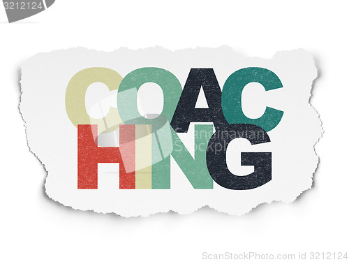 Image of Education concept: Coaching on Torn Paper background