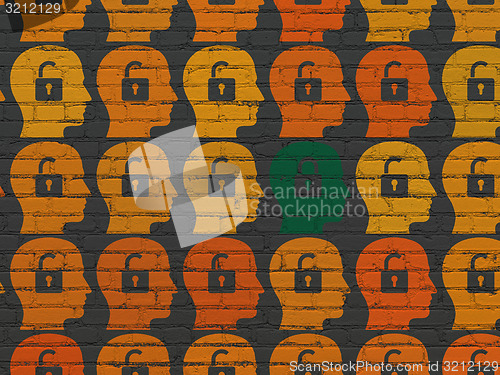 Image of Safety concept: head with padlock icon on wall background