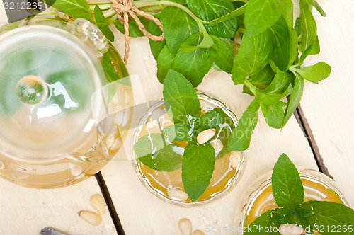 Image of Arab traditional mint and pine nuts tea