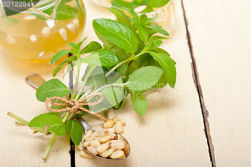 Image of Arab traditional mint and pine nuts tea