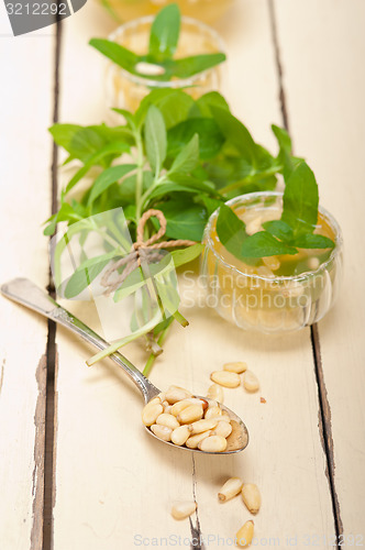 Image of Arab traditional mint and pine nuts tea