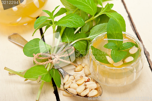 Image of Arab traditional mint and pine nuts tea