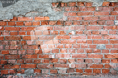 Image of old damaged brick wall