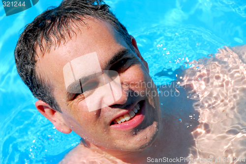 Image of Man swimming pool