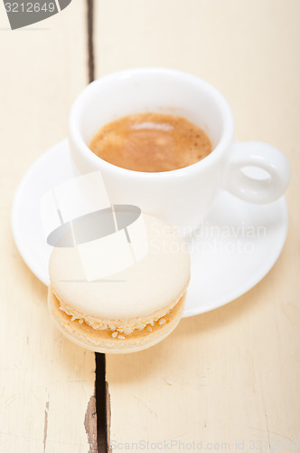 Image of colorful macaroons with espresso coffee 