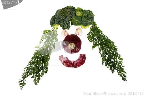 Image of Funny face with variety of vegetables isolated on white backgrou