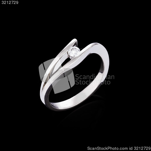 Image of Engagement diamond ring on black background