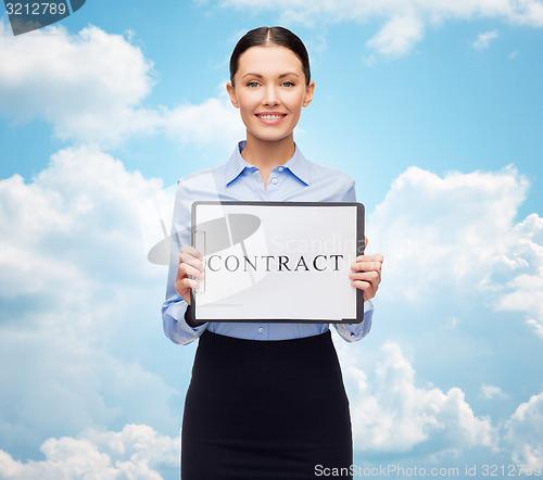 Image of smiling businesswoman with contract