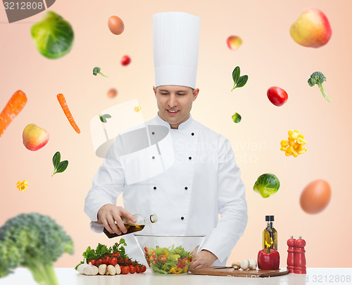 Image of happy male chef cook cooking food