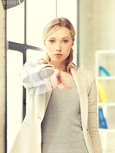 Image of businesswoman pointing her finger