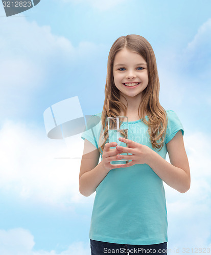 Image of smiling little girl with glass of water