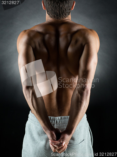 Image of young male bodybuilder from back