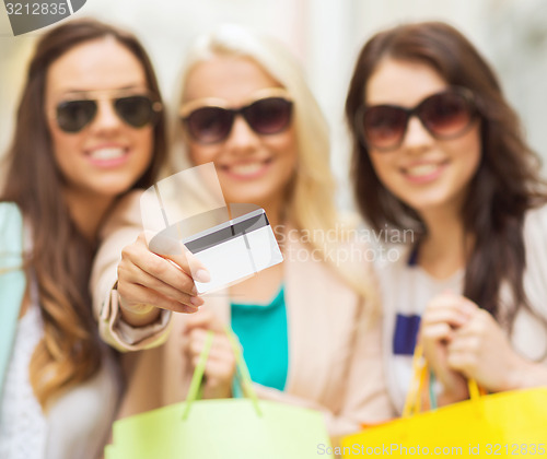 Image of girls with shopping bags in ctiy