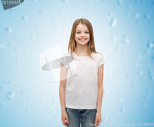 Image of smiling little girl in white blank t-shirt