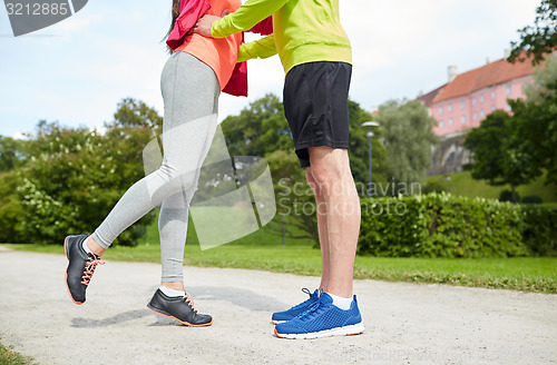Image of close up of couple in sportswear outdoors