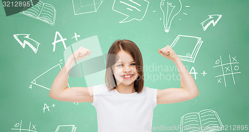 Image of smiling little girl in white blank t-shirt