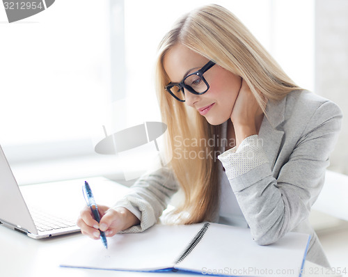 Image of businesswoman with documents