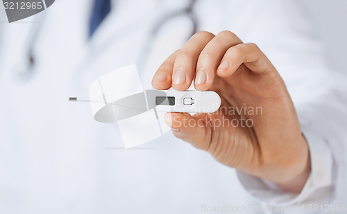 Image of male doctor with thermometer