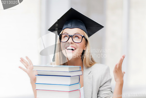 Image of happy student in graduation cap