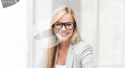 Image of businesswoman with pen