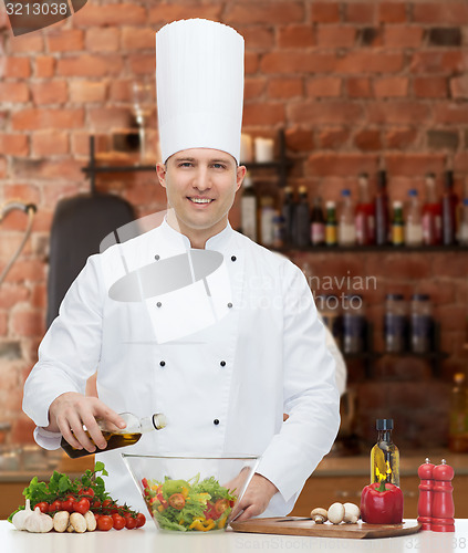 Image of happy male chef cook cooking food