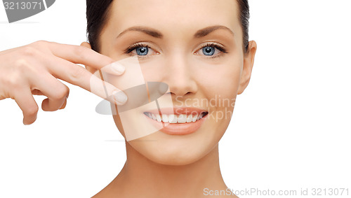 Image of face and hands of beautiful woman