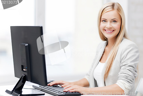 Image of businesswoman with computer