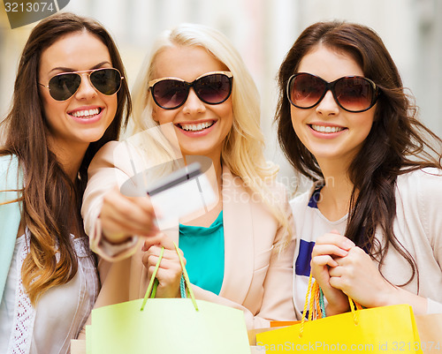 Image of girls with shopping bags in ctiy