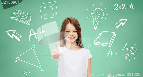 Image of smiling little girl in white blank t-shirt