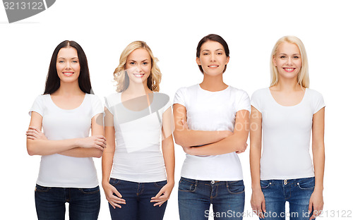 Image of group of smiling women in blank white t-shirts
