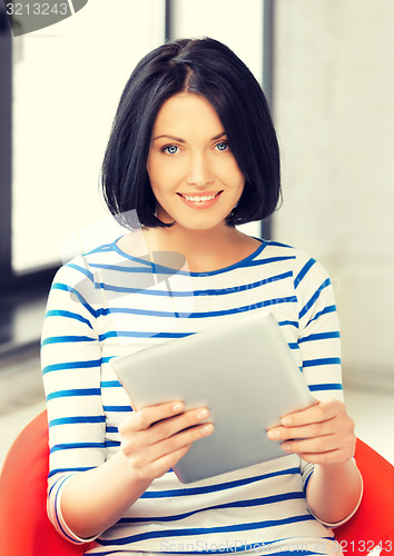 Image of happy teenage girl with tablet pc computer