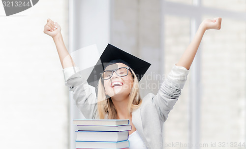 Image of happy student in graduation cap