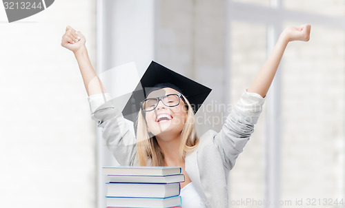 Image of happy student in graduation cap