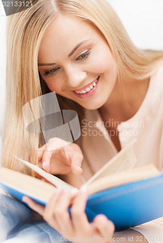 Image of woman reading book