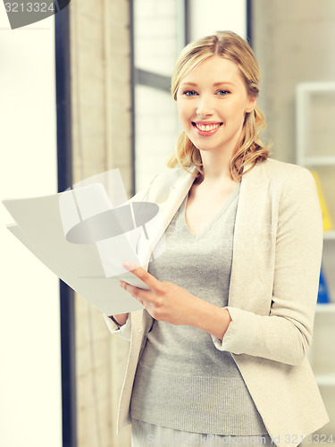 Image of happy woman with documents