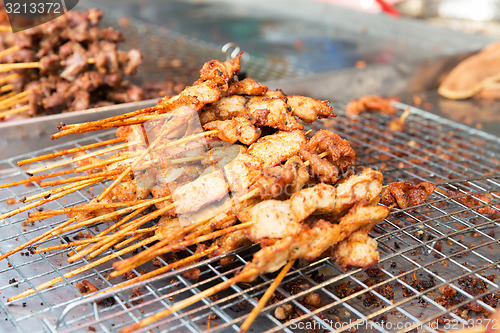 Image of meat grill at street market