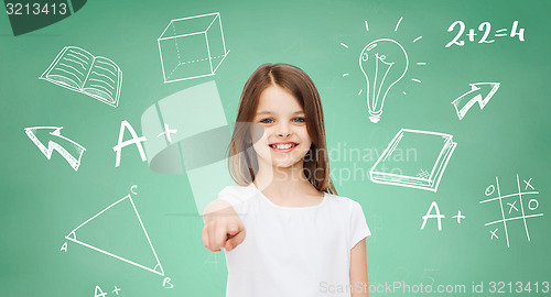 Image of smiling little girl in white blank t-shirt