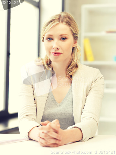 Image of calm and serious woman