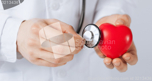 Image of man hands with heart