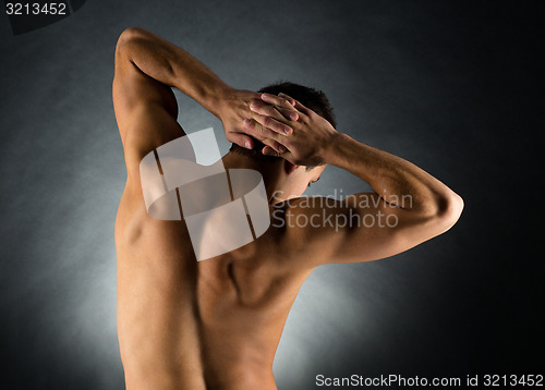 Image of young male bodybuilder from back