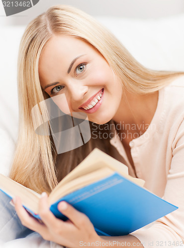 Image of woman reading book