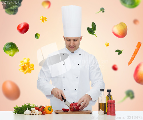 Image of happy male chef cook cooking food