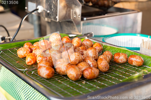 Image of fried meatballs sale at street market